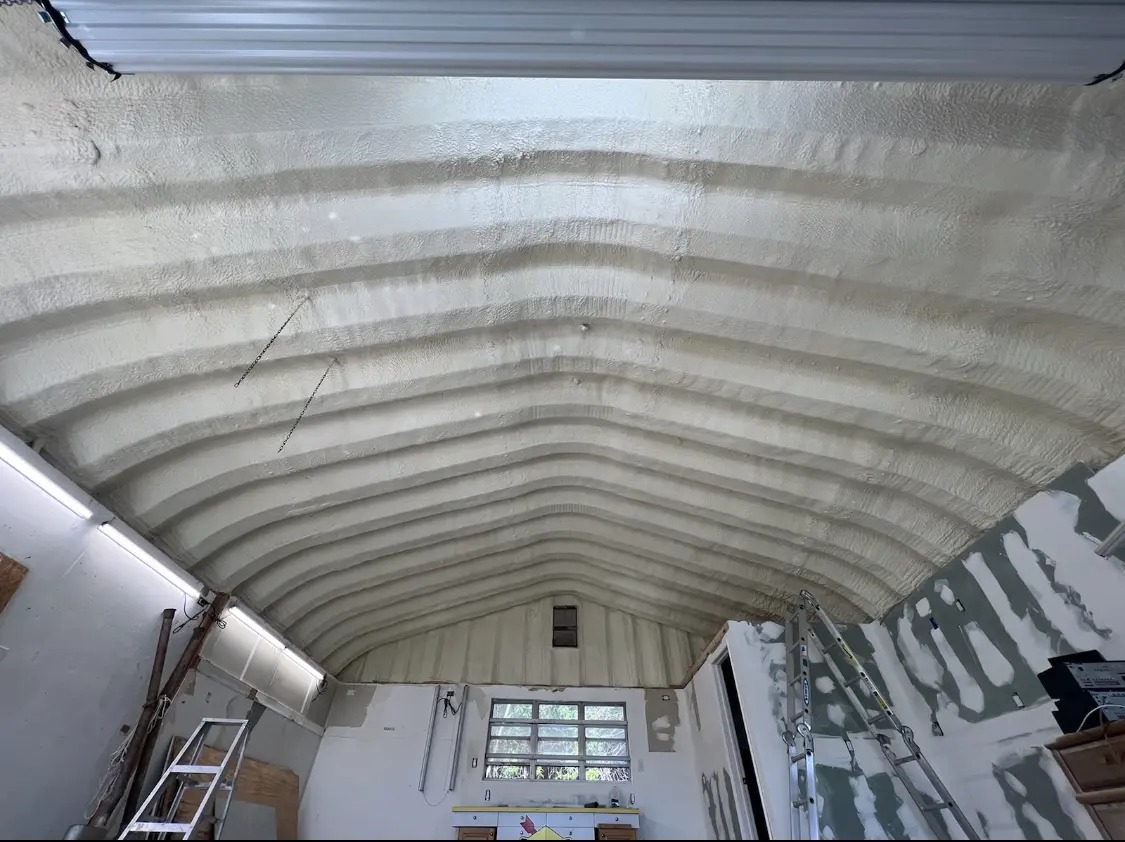 Spray polyurethane foam applied to the underside of a metal roof deck in Montevideo
